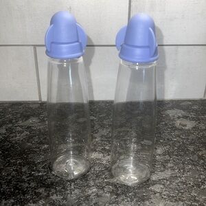 7 inch tall oil and vinegar containers. New without tags. Vintage Tupper…